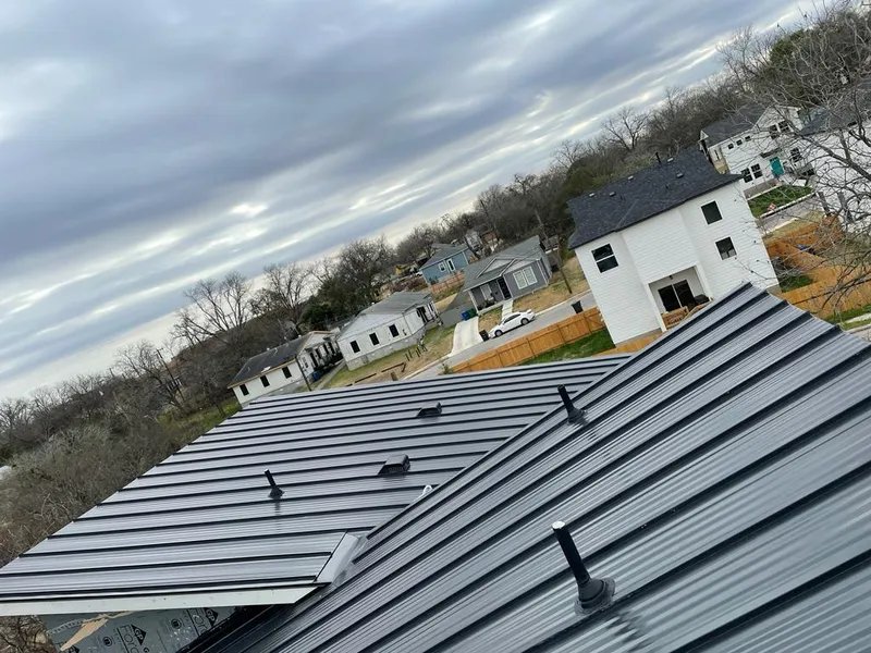 Standing seam metal roof panels with vents for Skylight Repair in Oak Ridge